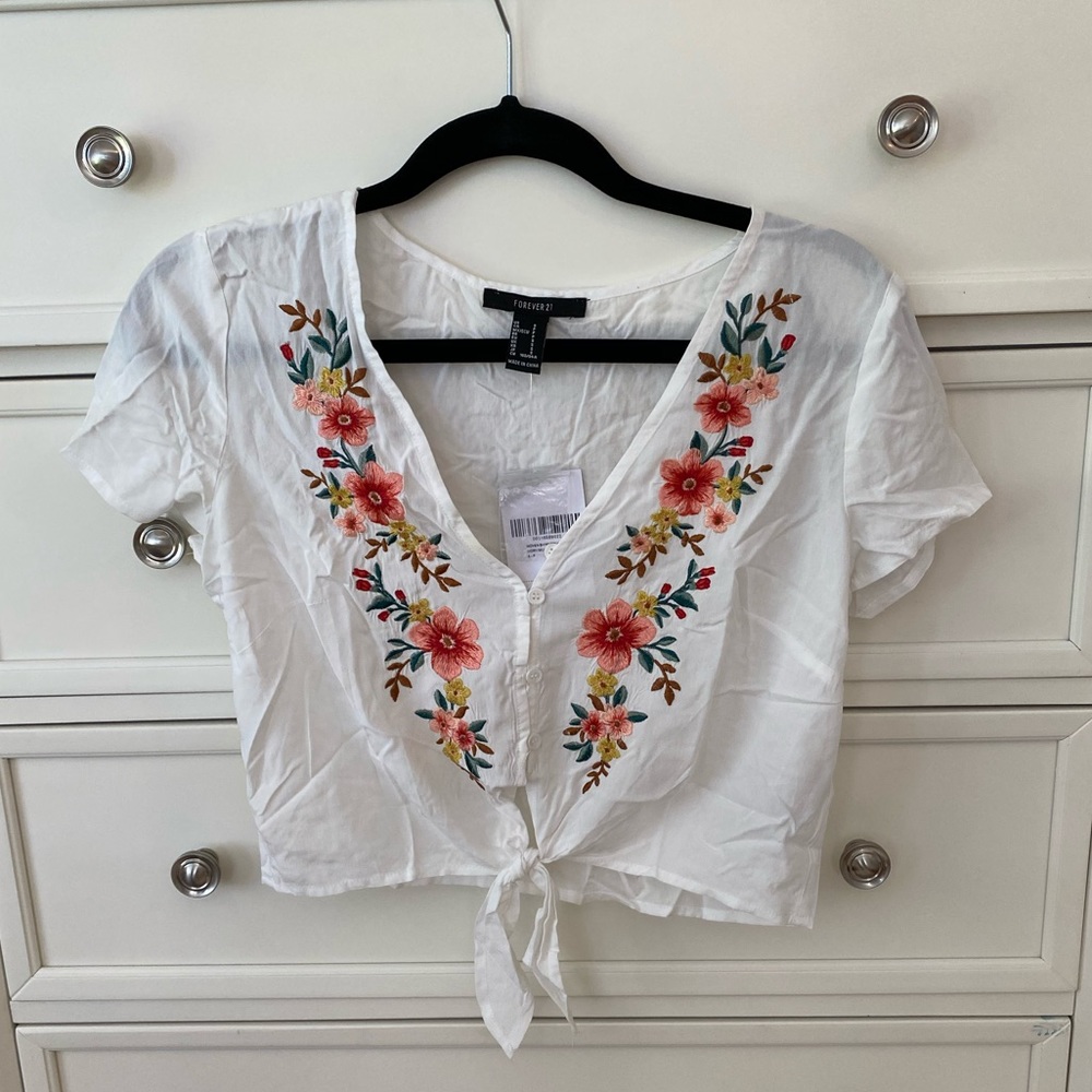 white embroidered flower top